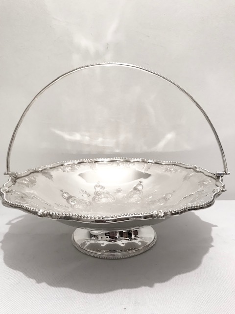 Antique Round Silver Plated Bread Fruit or Flower Basket Embossed and Engraved with Flowers to the Edge
