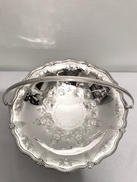 Antique Round Silver Plated Bread Fruit or Flower Basket Embossed and Engraved with Flowers to the Edge