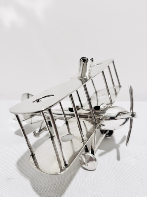 Novelty Silver Plated Model of a Bi-Plane Holding Four Flutes for Flowers