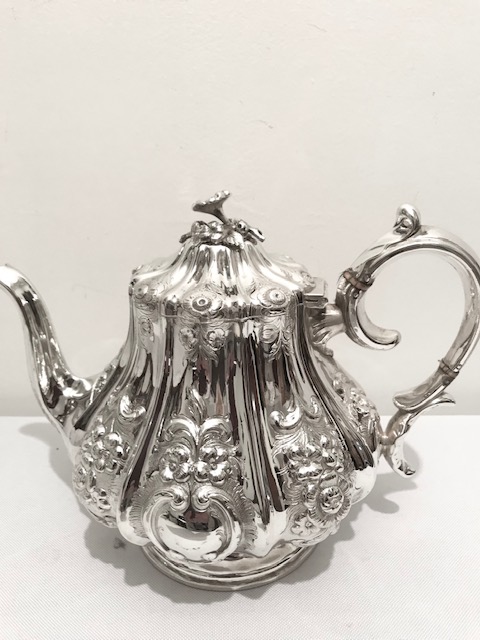 Elaborately Embossed Victorian Silver Plated Teapot Decorated with Flowers Leaves and Scrolls