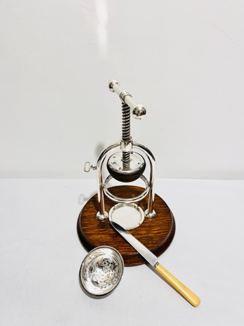 Antique Silver Plated and Oak Lemon Squeezer or Juicer Antique Silver Plated and Oak Lemon Squeezer or Juicer