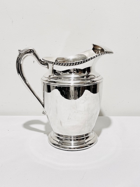 Vintage Silver Plated Water Pitcher with Shaped Handle