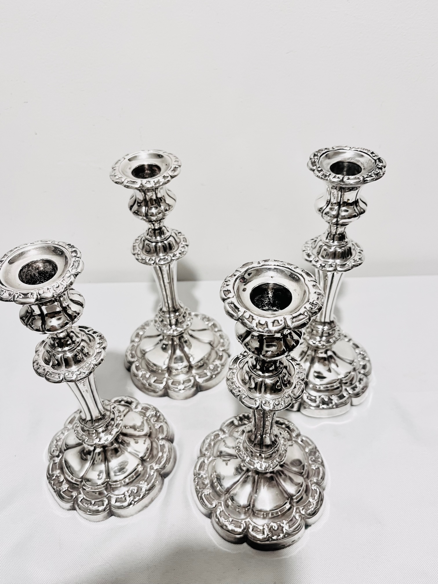 Set of Four Antique Silver Plated Candlesticks