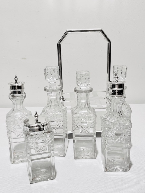 Antique Silver Plated and 6 Bottle Cut Glass Cruet