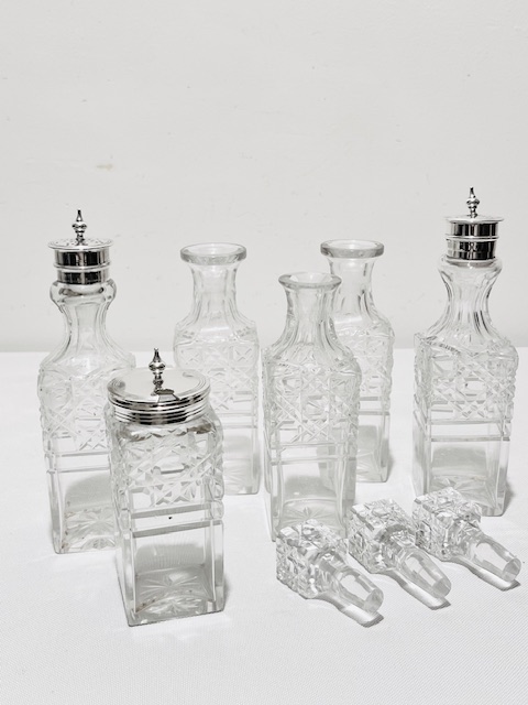 Antique Silver Plated and 6 Bottle Cut Glass Cruet