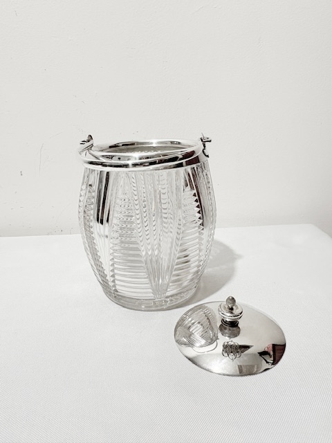 Antique Silver Plated and Cut Glass Biscuit Barrel with Swing Handle Antique Silver Plated and Cut Glass Biscuit Barrel with Swing Handle