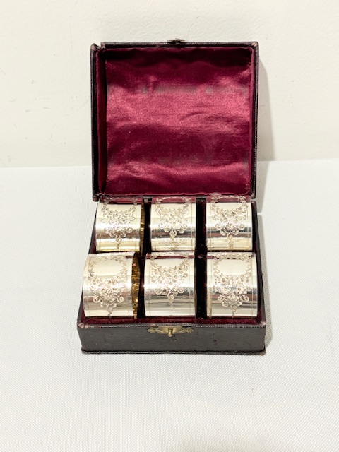 Six Boxed Antique Silver Plated Napkin Rings