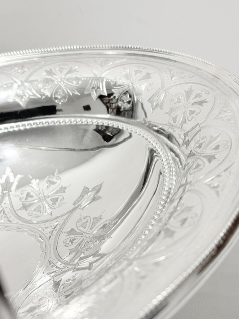 Antique Silver Plated Oval Bread Fruit Basket with Swing Handle Antique Silver Plated Oval Bread Fruit Basket with Swing Handle