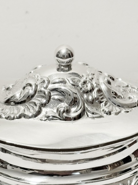 Antique Silver Plated Tea Caddy Embossed with Scrolls Flowers and Leaves Antique Silver Plated Tea Caddy Embossed with Scrolls Flowers and Leaves