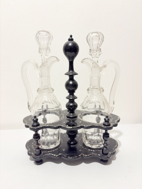 Antique Oil & Vinegar Set Housed in a Black Papier Mache Stand Antique Oil & Vinegar Set Housed in a Black Papier Mache Stand