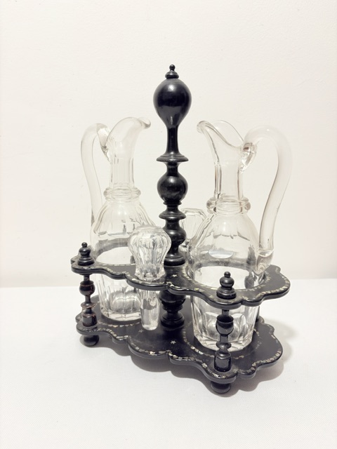 Antique Oil & Vinegar Set Housed in a Black Papier Mache Stand Antique Oil & Vinegar Set Housed in a Black Papier Mache Stand